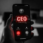 A hand holds a smartphone showing an incoming call labeled CEO with a red glitch effect, suggesting AI voice fraud.
